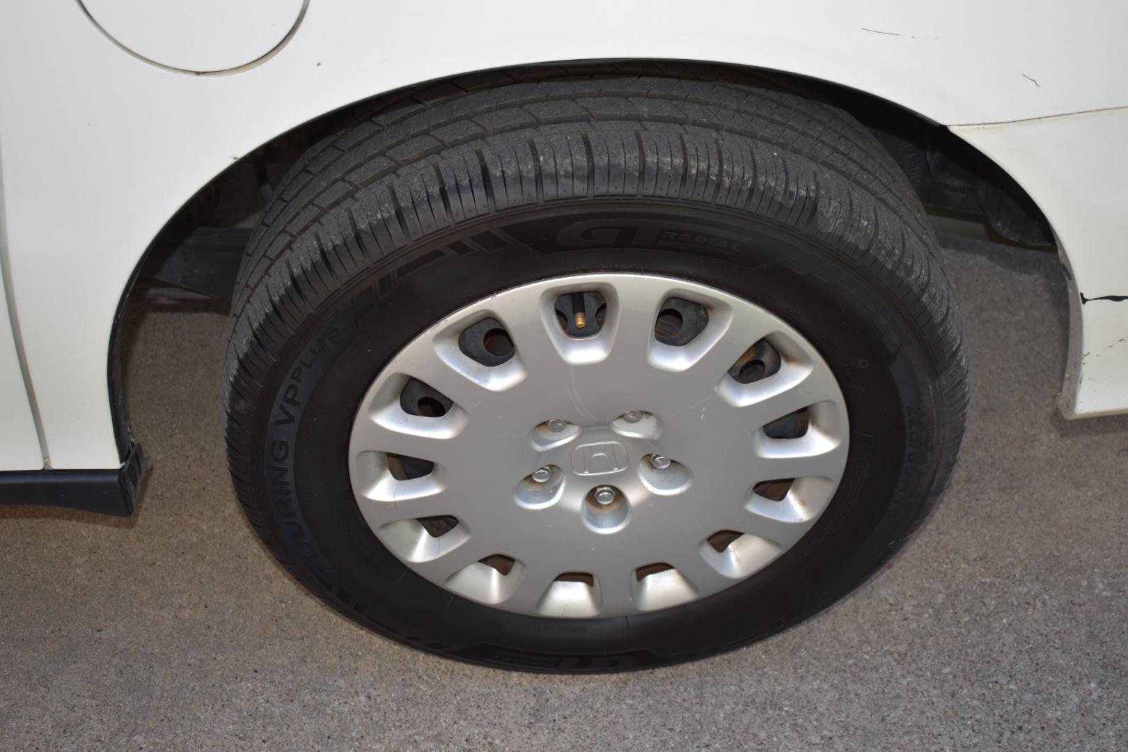 2003 White /Gray Honda Odyssey (5FNRL18513B) , located at 5925 E. BELKNAP ST., HALTOM CITY, TX, 76117, (817) 834-4222, 32.803799, -97.259003 - Buying a 2003 Honda Odyssey can be a smart choice for several reasons: Reliability: Hondas are known for their reliability, and the Odyssey is no exception. The 2003 model year is often praised for its durability and long-lasting performance. Safety: The 2003 Honda Odyssey comes equipped with safe - Photo#26